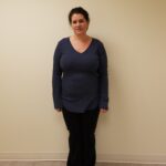 Front view of woman in blue before reshape procedure