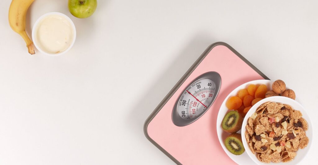 scale with fruit sitting on it