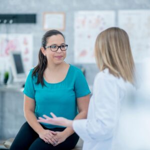 person talking to gastroenterology physician about FibroScan®