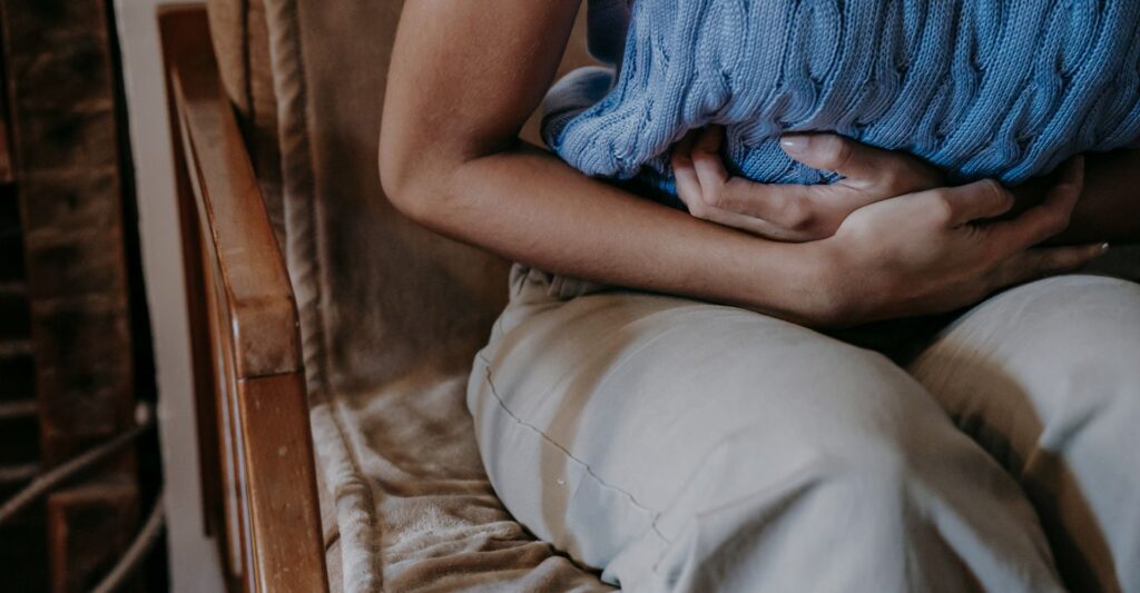 person with stomach pain