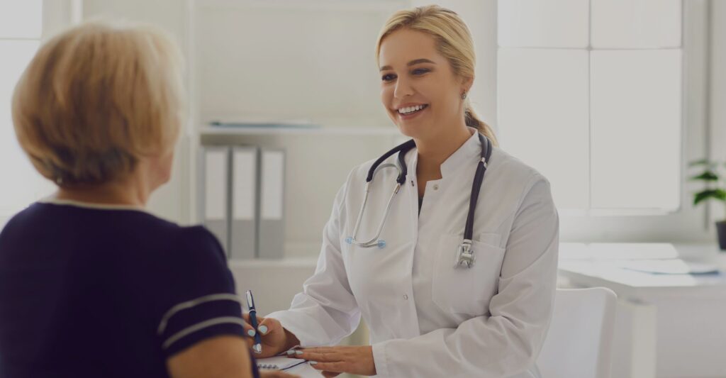 woman meeting with a gastroenterologist